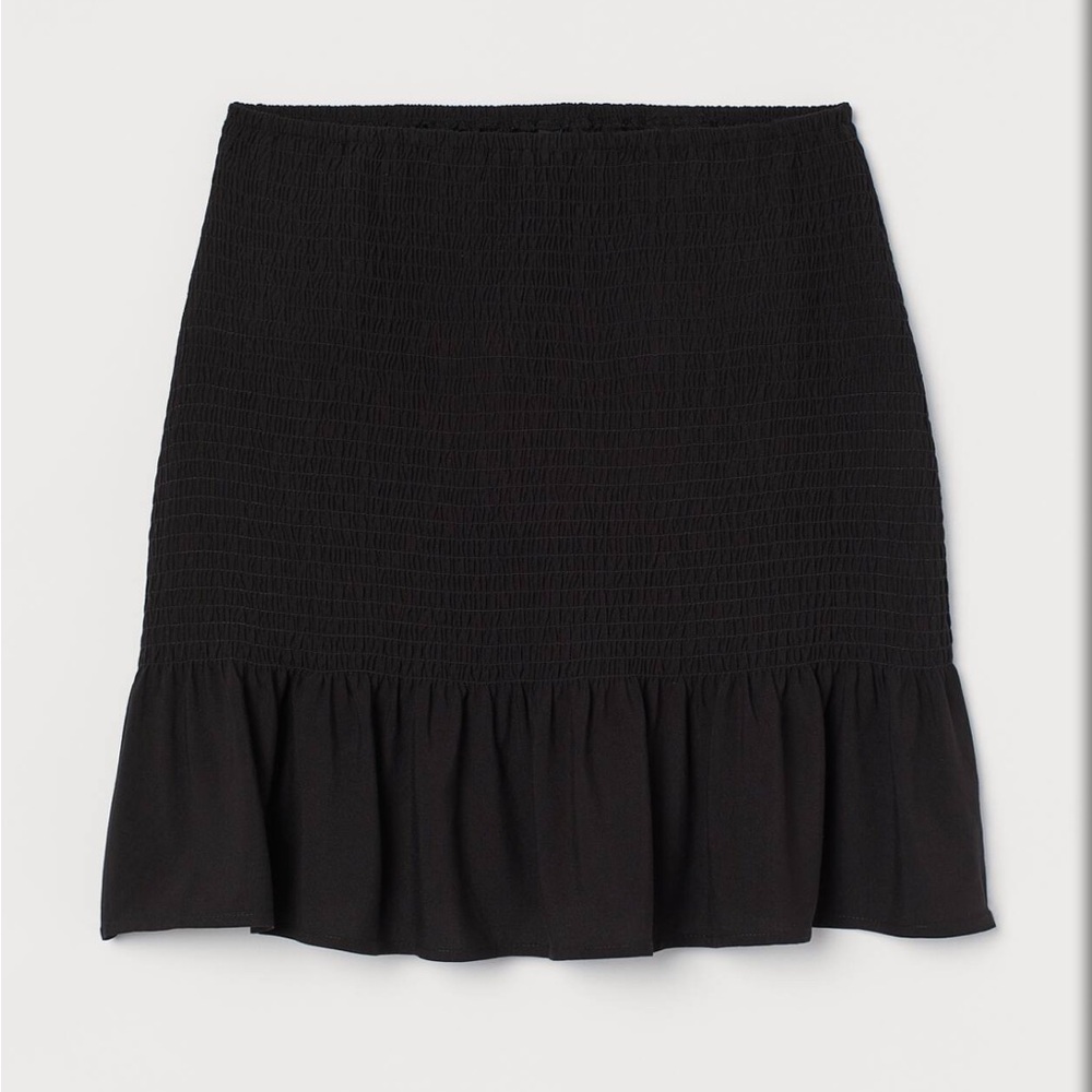 Black Smocked Mini Skirt with Ruffle Hem